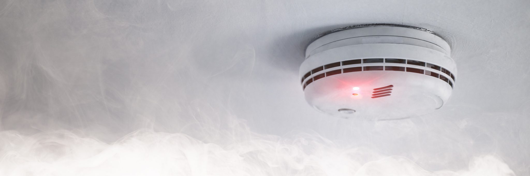 Smoke detector in case of fire alarm as fire protection warning